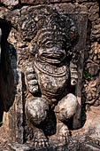 Thailand, Old Sukhothai - Wat Mahathat, stucco figures that decorate the base of the multi-layered chedi to the South of the complex. 